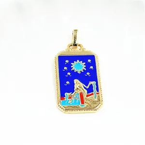 Macro detail of gold-plated Tarot The Star pendant with blue enamel inlay finish