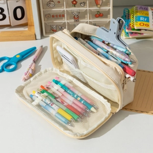 Close-up of cream large capacity pencil case with mesh pockets and multi-layer storage