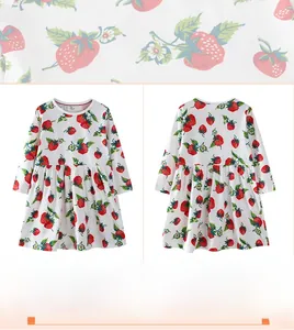 Close-up of soft knit fabric with vibrant strawberry and green leaf patterns for girl dress
