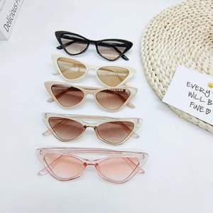 Five pairs of vintage triangle cat eye sunglasses in assorted trendy candy colors