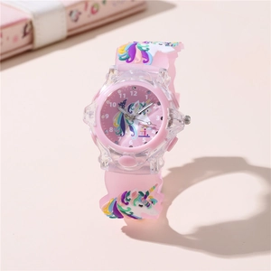 Close-up of pink children's unicorn watch with 3D embossed silicone strap and numerals