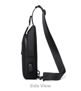 Side view of black crossbody chest bag featuring an integrated USB charging port