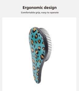 Ergonomic hairbrush with leopard print showing a comfortable grip and sleek design
