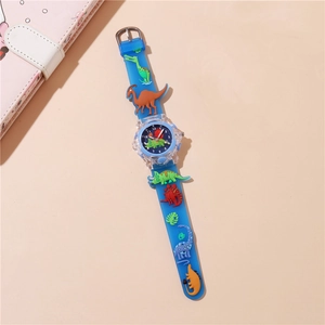 Close-up of 3D dinosaur ornaments on a blue silicone strap for children's watch
