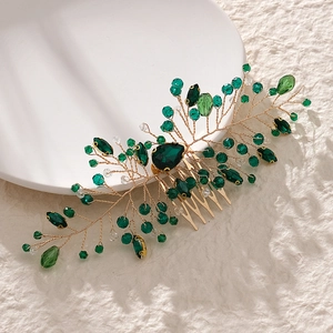 Peigne à cheveux doré pour mariée avec cristaux verts et motifs de feuilles