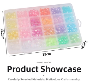 Detailed top view of 24-compartment storage box with assorted DIY heart and letter beads