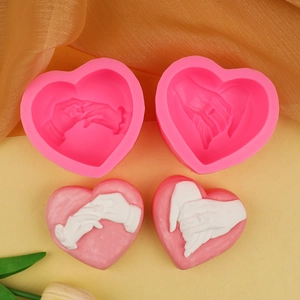 Macro shot of 3D heart-shaped hand-holding silicone mold with fine texture detail