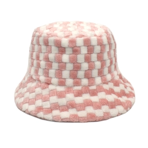 Detail view of the pink and white checkered faux fur texture on this plush winter bucket hat