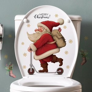Removable Santa on scooter toilet lid sticker with snowflakes for Christmas decor