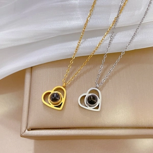 Minimalist titanium steel heart projection necklaces in gold and silver finishes