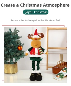 Detail of plush Christmas reindeer doll with striped scarf and red hat in festive setting