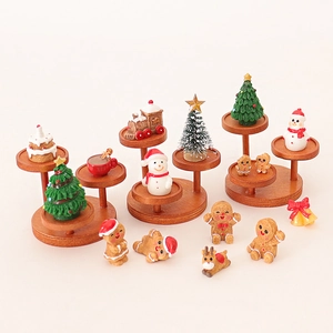 Miniature Christmas ornament set with snowman gingerbread man and wooden display stand