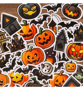 Variety of Halloween stickers with pumpkins and ghosts on a rustic wooden background
