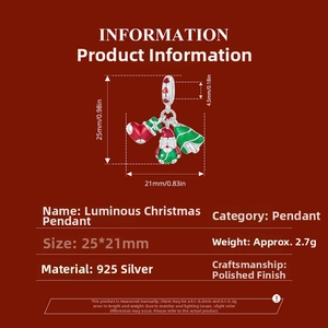 Detail view of 925 silver noctilucent Christmas pendant with Santa and bell icons
