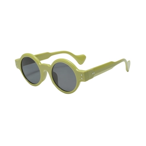 Green steampunk round frame sunglasses with thick edges and silver rivet accents