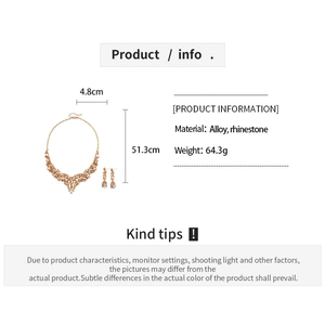 Detailed view of rhinestone necklace and teardrop earrings set with dimension markings