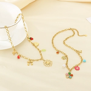 Golden stainless steel necklaces with colorful resin flower, strawberry and butterfly charms