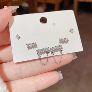 Detailed shot of three S925 silver cubic zirconia earring sets with elegant tassels