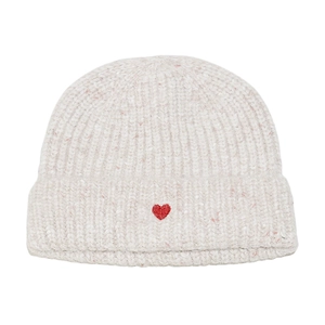 Detailed view of cream rib-knit beanie featuring pink flecks and red heart embroidery