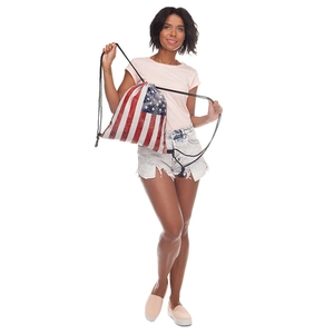 Drawstring backpack with American flag print shown on a model for casual streetwear style