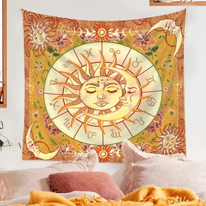 Detail of sun and moon tapestry with zodiac symbols and vintage floral patterns