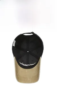 Detail of cotton baseball cap interior with contrast brim and adjustable strap