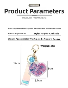 Detail showing dimensions of heart-shaped liquid quicksand keychain with pink sequins