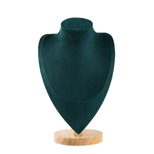 Necklace display stand with dark green velvet bust and solid wooden base for jewelry