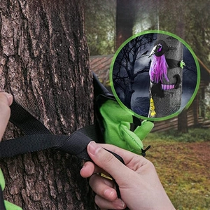 Detail of Halloween witch tree wrap featuring purple hair and secure nylon straps for easy setup