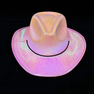 Macro detail of the holographic pink surface texture on the LED cowboy party hat