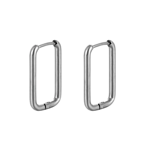 Detailed view of silver rectangular geometric earrings with a polished metal finish