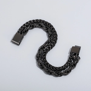 Detail of men's double-layer black titanium steel chain bracelet with a square clasp