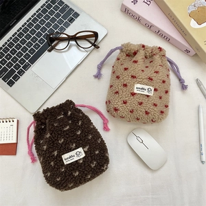 Soft fleece drawstring pouch with heart patterns, cozy storage bag for makeup or travel