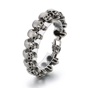 Vintage silver skull bracelet for men in gothic punk style with retro steel finish