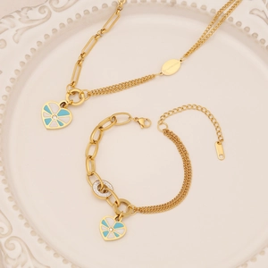 Set di gioielli a cuore in acciaio inossidabile dorato con smalto blu e cristalli