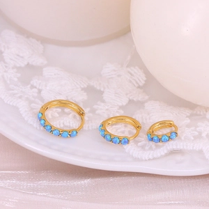 S925 sterling silver gold hoop earrings with blue opal inlay on white lace background