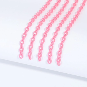 Close-up of pink 6x8mm acrylic link chains for DIY jewelry making and bag accessories