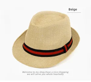 Detailed close-up of breathable linen fedora texture with black and red striped ribbon