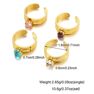 Detail showing dimensions of gold-plated twisted rings with colorful round zircon stones