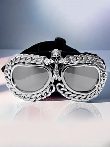 Detail of gothic punk goggles with silver skull bridge and metal chain frame details