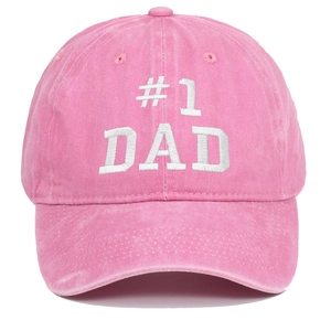 Detailed view of white #1 DAD embroidery on pink vintage washed cotton baseball cap