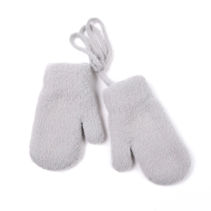 Detail of plush grey winter mittens for kids featuring soft faux fur and anti-lost string
