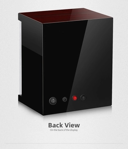 Detail view showing DC power port and control switches on the back of the watch winder