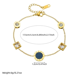 Gold plated bracelet with Roman numeral ring and black square crystal pendant charm