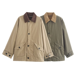 Detailed close-up of khaki and green workwear jackets with corduroy collar and large pockets