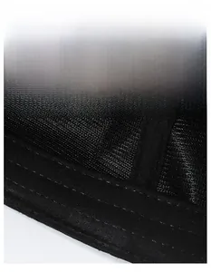 Detail of breathable black mesh fabric and moisture-wicking sweatband on the baseball cap