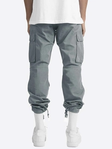 Rear view of grey cargo pants showing functional back pockets and adjustable drawstring cuffs