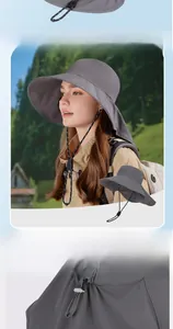Detail of dark grey sun hat featuring a large brim and 20cm neck protection flap