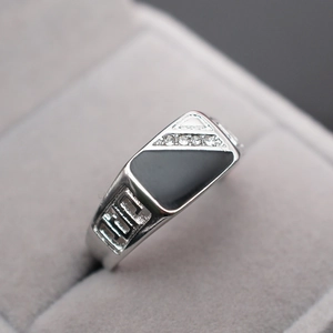 Men's square stainless steel ring with black enamel and zircons on jewelry box