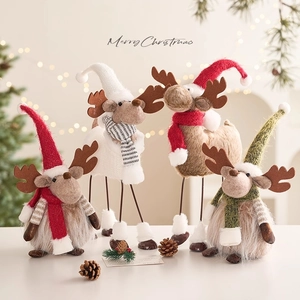 Nordic felt Christmas reindeer ornaments with scarves and pine cones for festive decor